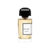 BDK Parfums Pas Ce Soir Eau de Parfum 100 ml, skaidrus buteliukas su gintariniu skysčiu ir juoda kepurėle